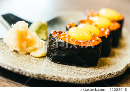 Sushi with salmon eggs Sushi with salmon eggs 31088648