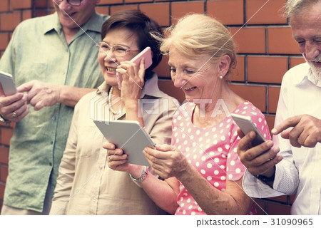 Senior Adult Use Tablet Mobile Phone Technology Senior Adult Use Tablet Mobile Phone Technology 31090965