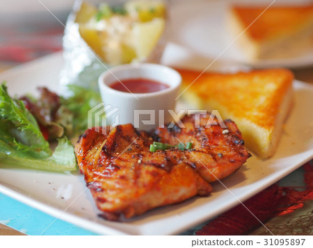 Chicken steak with dipping sauce 31095897