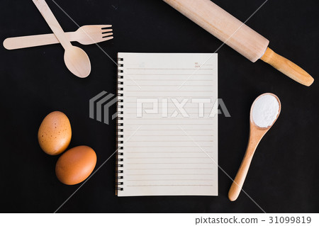 Baking cake ingredients,book,spoon, flour, eggs 31099819