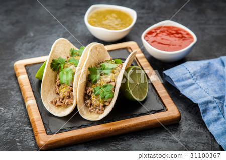 Mexican tacos with beef 31100367