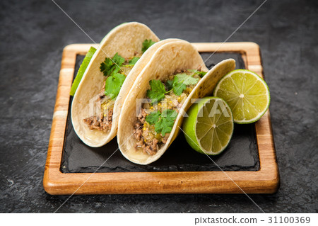 Mexican tacos with beef 31100369