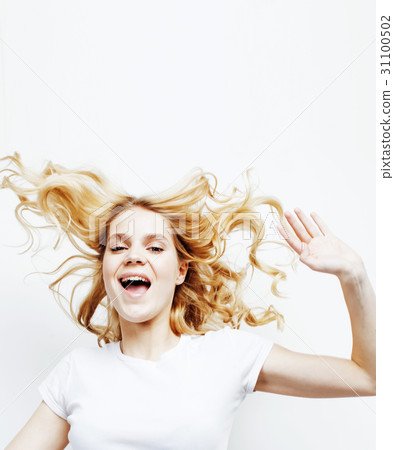 young pretty blond teenage girl emotional posing 31100502