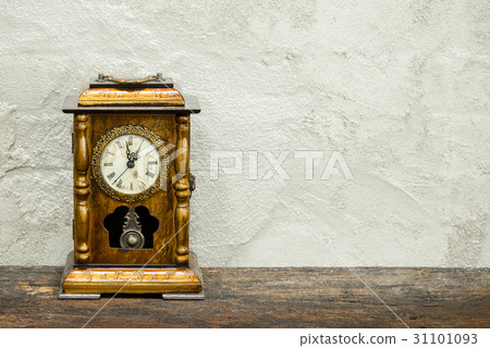 still life of antique clock on woolden plank still life of antique clock on woolden plank 31101093