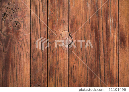 Vintage brown weathered wooden wall with knots 31101496