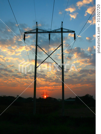 transmission power line on sunset 31102720