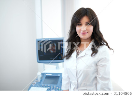 Pretty doctor against ultrasound equipment and Pretty doctor against ultrasound equipment and 31104866