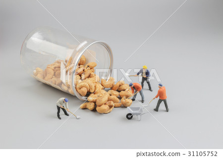 group of Mini farmers preparing nuts group of Mini farmers preparing nuts 31105752