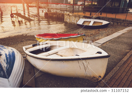 Row boats on the shore. Row boats on the shore. 31107152