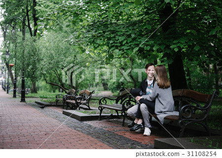 Romantic couple on bench Romantic couple on bench 31108254