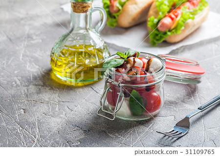 Caprese in a jar for lunch. Caprese in a jar for lunch. 31109765