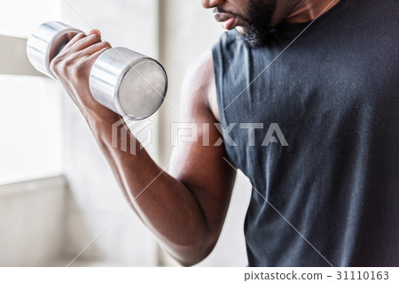 Concentrated african sportsman training his 31110163