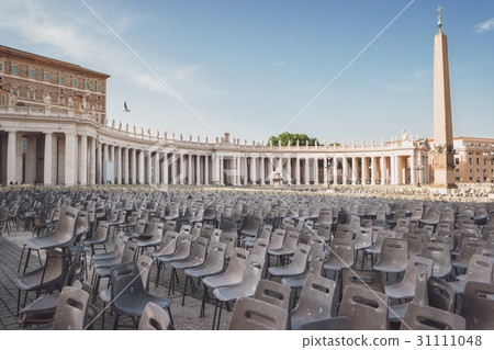 Many chairs on town square. 31111048