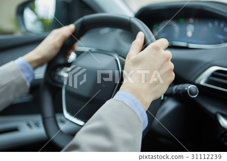 Business woman driving her new  car 31112239