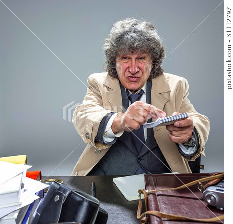The senior man as detective or boss of mafia on The senior man as detective or boss of mafia on 31112797
