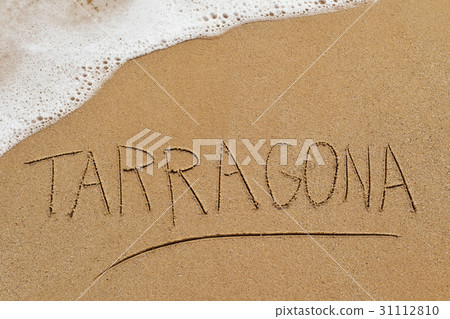 word Tarragona written in the sand of a beach word Tarragona written in the sand of a beach 31112810