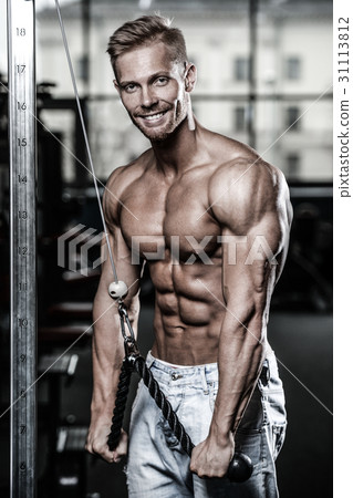 Brutal caucasian handsome fitness men on diet training triceps g 31113812