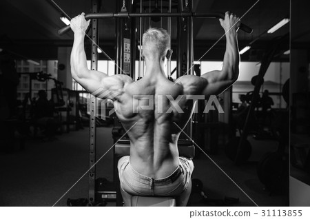 Handsome power athletic man diet training pumping up back muscle Handsome power athletic man diet training pumping up back muscle 31113855