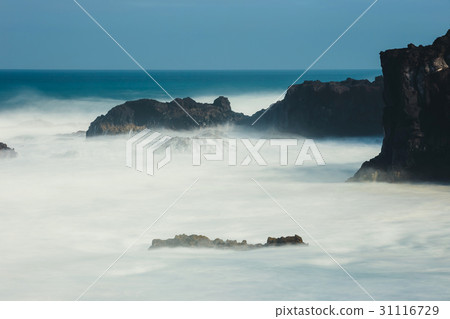 Los Hervideros, volcanic coastline with wavy ocean 31116729
