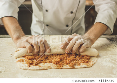 Bakery chef cooking bake in the kitchen Bakery chef cooking bake in the kitchen 31116839