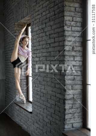 Ballerina posing in studio 31117588