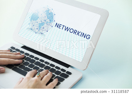 Hands working on laptop network graphic overlay Hands working on laptop network graphic overlay 31118587