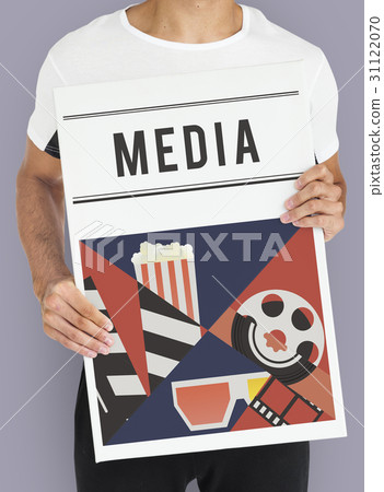 Man holding banner of movies theatre media entertainment Man holding banner of movies theatre media entertainment 31122070