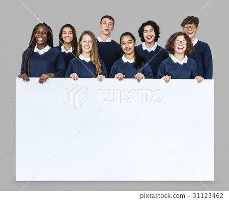 Diverse Group Of Students Holding Placard Diverse Group Of Students Holding Placard 31123462