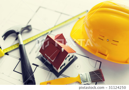 close up of house blueprint with building tools 31124250