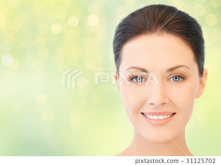 close up of beautiful young woman face close up of beautiful young woman face 31125702