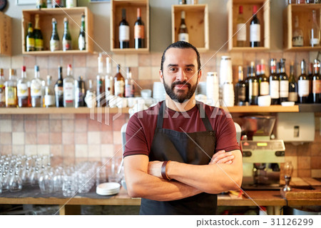 happy man, barman or waiter at bar 31126299