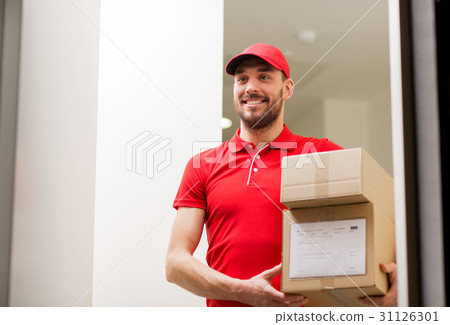 delivery man with parcel boxes at customer door 31126301