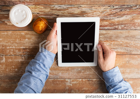 businessman hands with tablet pc and coffee businessman hands with tablet pc and coffee 31127553