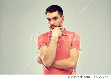 man thinking over gray background 31127743