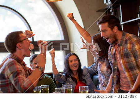 football fans or friends with beer at sport bar 31127887