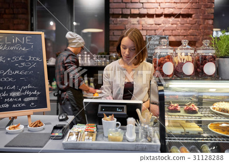 woman or barmaid with cashbox at cafe woman or barmaid with cashbox at cafe 31128288