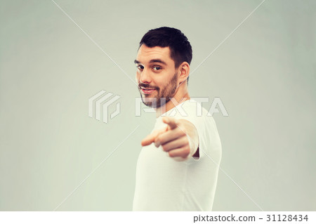 man pointing finger to you over gray background 31128434