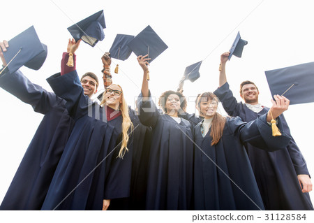 happy students or bachelors waving mortar boards 31128584