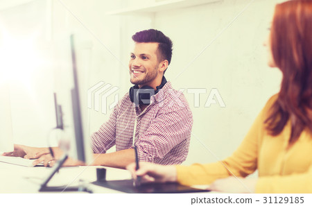 creative team with headphones and computer creative team with headphones and computer 31129185