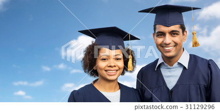 students or bachelors in mortar boards over sky students or bachelors in mortar boards over sky 31129296