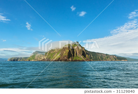 Beautiful coast of Kamchatka in clouds Beautiful coast of Kamchatka in clouds 31129840