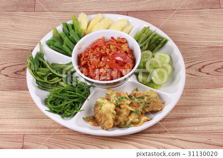 Spicy meat and tomato dip call Nam Prik Ong. 31130020