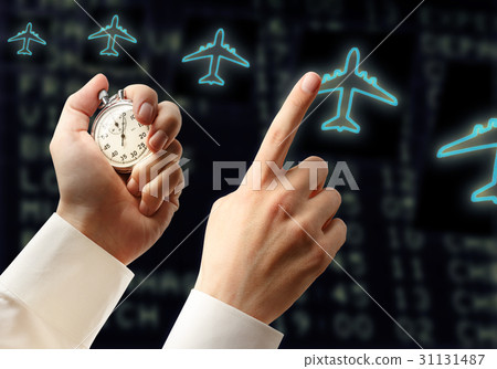 Stopwatch, pointing forefinger and airplanes 31131487