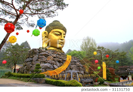 Golden head big Buddha statue.The Yunwha Mountain. 31131750
