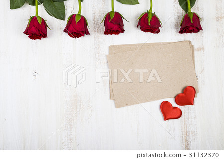 Red roses and paper for congratulations Red roses and paper for congratulations 31132370