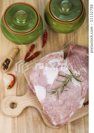 Pork and pots on the table. Cooking. 31132788