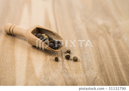 Chilli peppers on a wooden board 31132790