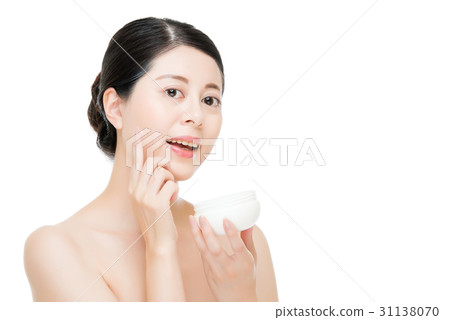 asian woman use hand  applying facial product 31138070