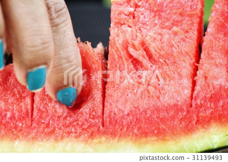Woman eating watermelon Woman eating watermelon 31139493