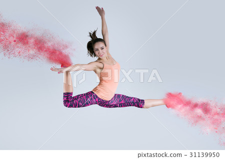Woman in jump. Frozen motion. Woman in jump. Frozen motion. 31139950